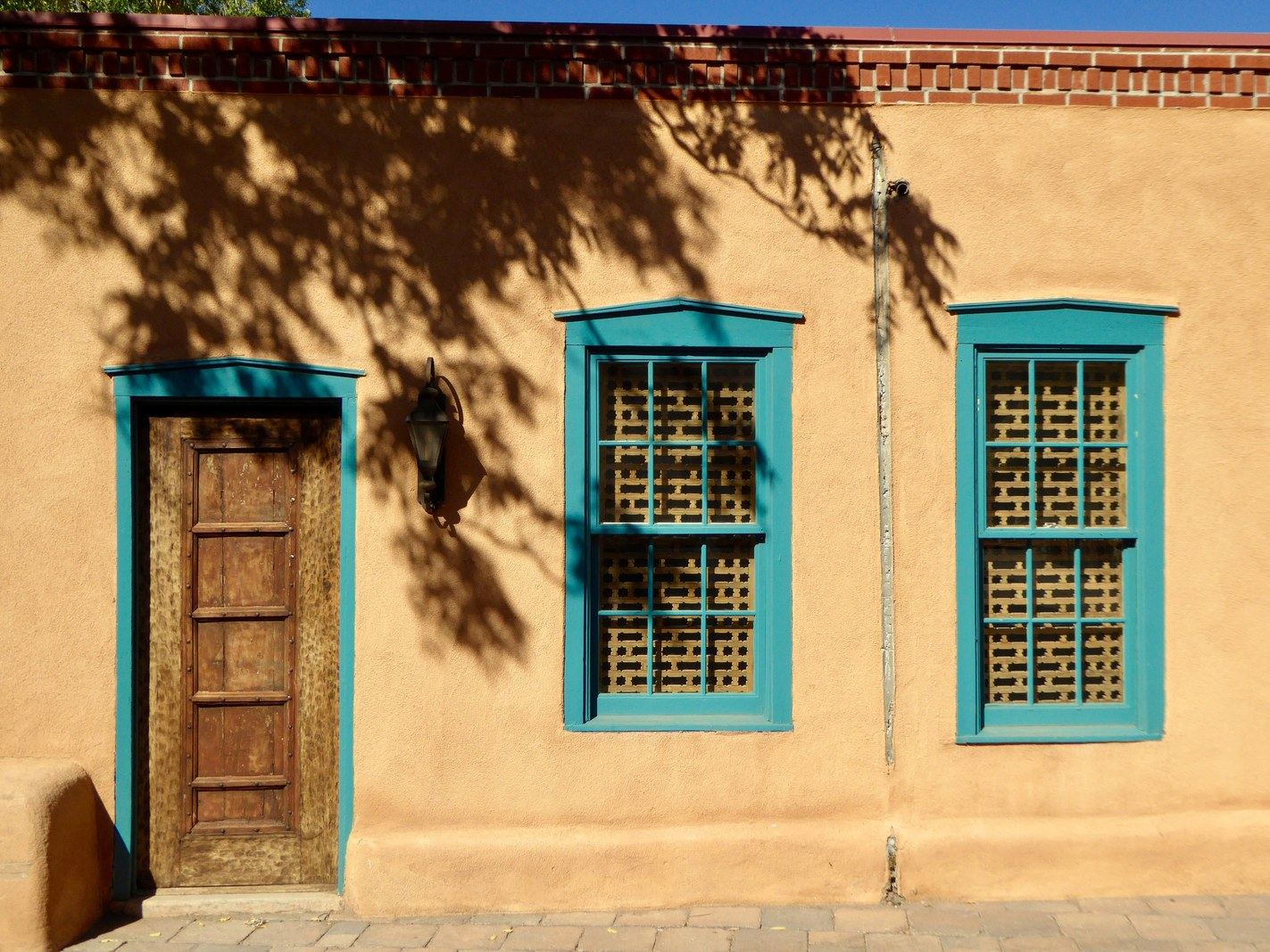Adobe building with turquoise windows, Santa Fe